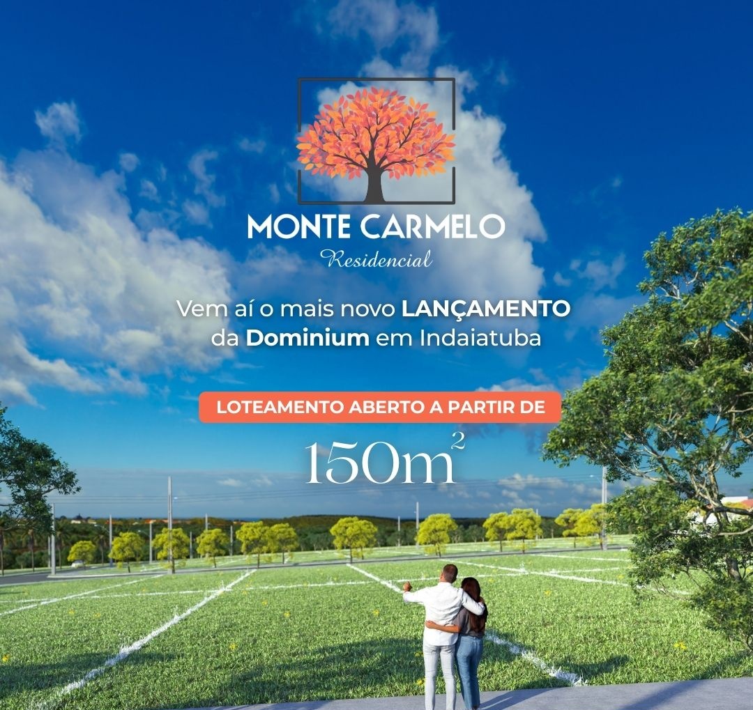 Casal olhando para os lotes disponíveis no empreendimento Monte Carmelo.